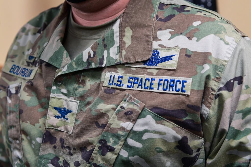 Col. Richard Bourquin, Space Delta 4 commander, poses for a detailed photo of his new U.S. Space Force patches after commissioning into the USSF in the DEL 4 conference room on Buckley Air Force Base, Colo., Jan. 5, 2021. (Airman 1st Class Joshua T. Crossman/Space Force)