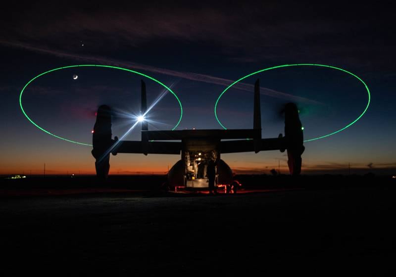 An MV-22 Osprey stages during a night during a Tactical Recovery of Aircraft and Personnel (TRAP) exercise at Marine Corps Base Camp Pendleton, Calif., Dec. 16, 2020.