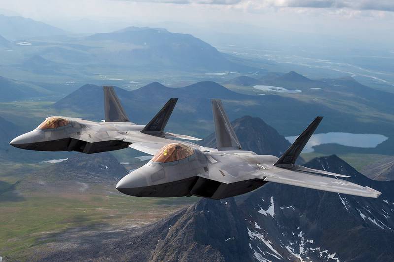 Air Force F-22 Raptors from Joint Base Elmendorf-Richardson fly in formation over the Joint Pacific Alaska Range Complex, July 18, 2019.