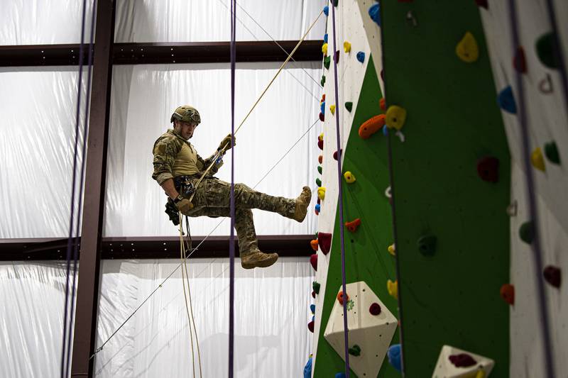A pararescueman assigned to the 38th Rescue Squadron rappels down a climbing wall during high angle rescue training, April 28, 2020, at Moody Air Force Base, Ga.